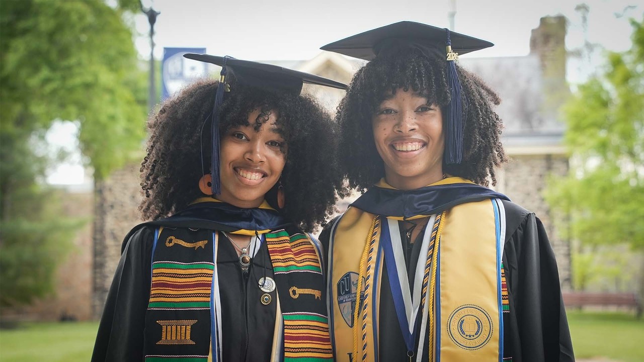Twins Achieve Rare Double Honor Graduating Top of Class for Late Father